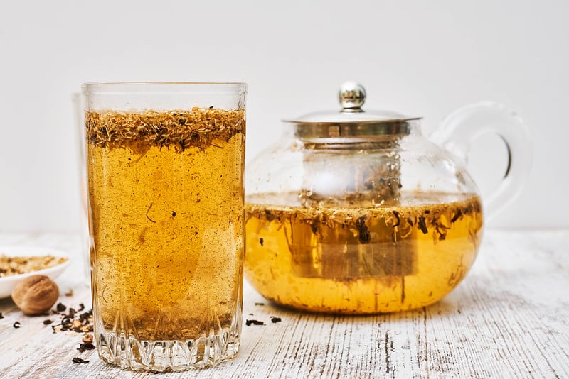 Vegan dandelion honey is delicious in tea.