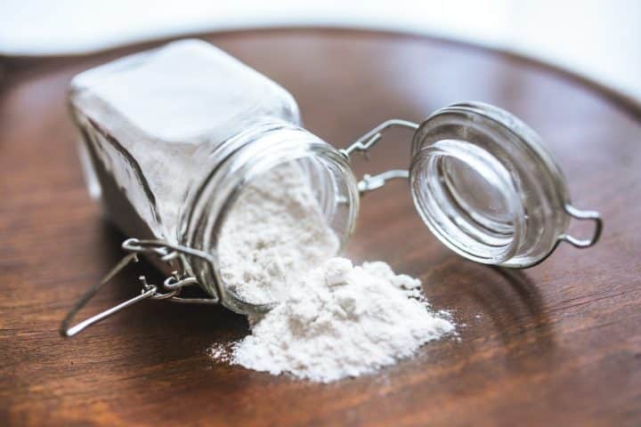 You can use baking soda as a homemade natural weed killer